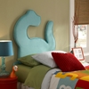 Dinoroar Twin Platform Bed The Dinoroar Twin Platform Bed will brighten up any kid's room with some prehistoric fun. The dinosaur headboard comes fully upholstered in funky turquoise polyester.